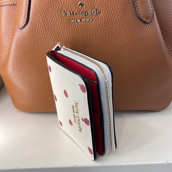 Kate Spade Staci Small Ladybug Zip Around Wallet
COLOR:
Cream Multi - Picture 16 of 16